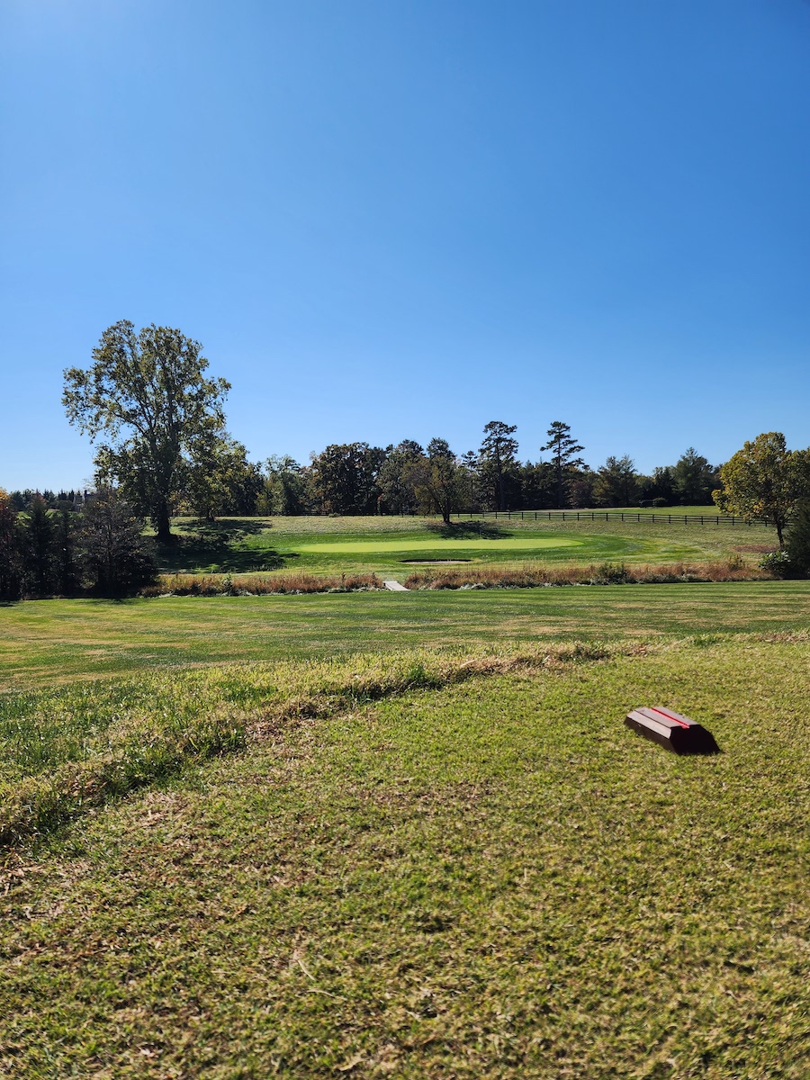 Vibrant landscape of a golf course in Crozet, VA, featuring lush greenery and well-maintained lawns