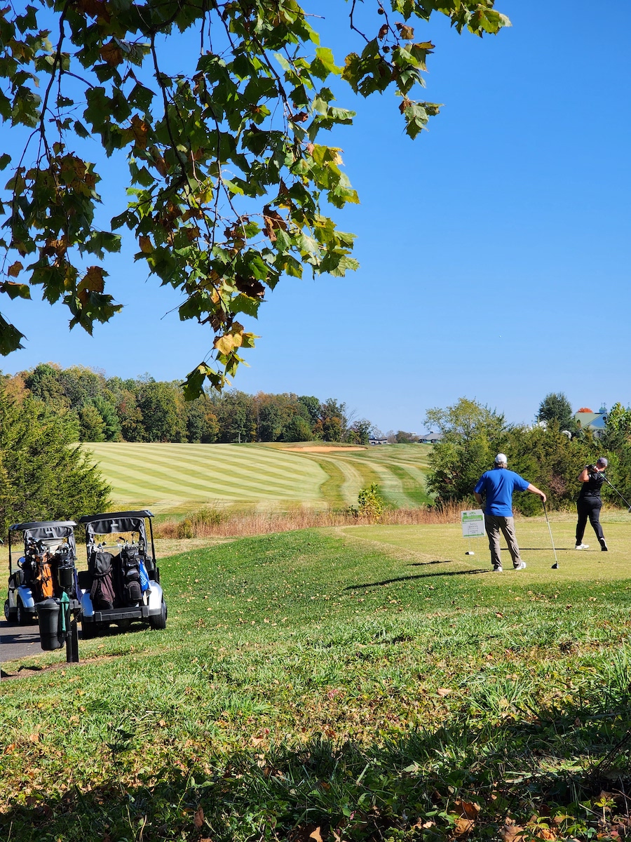 Scenic view of a golf course in Crozet, VA, surrounded by lush trees